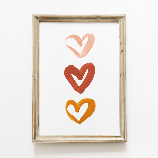 Poster ‘3 cœurs’ brique, moutarde et rose A4